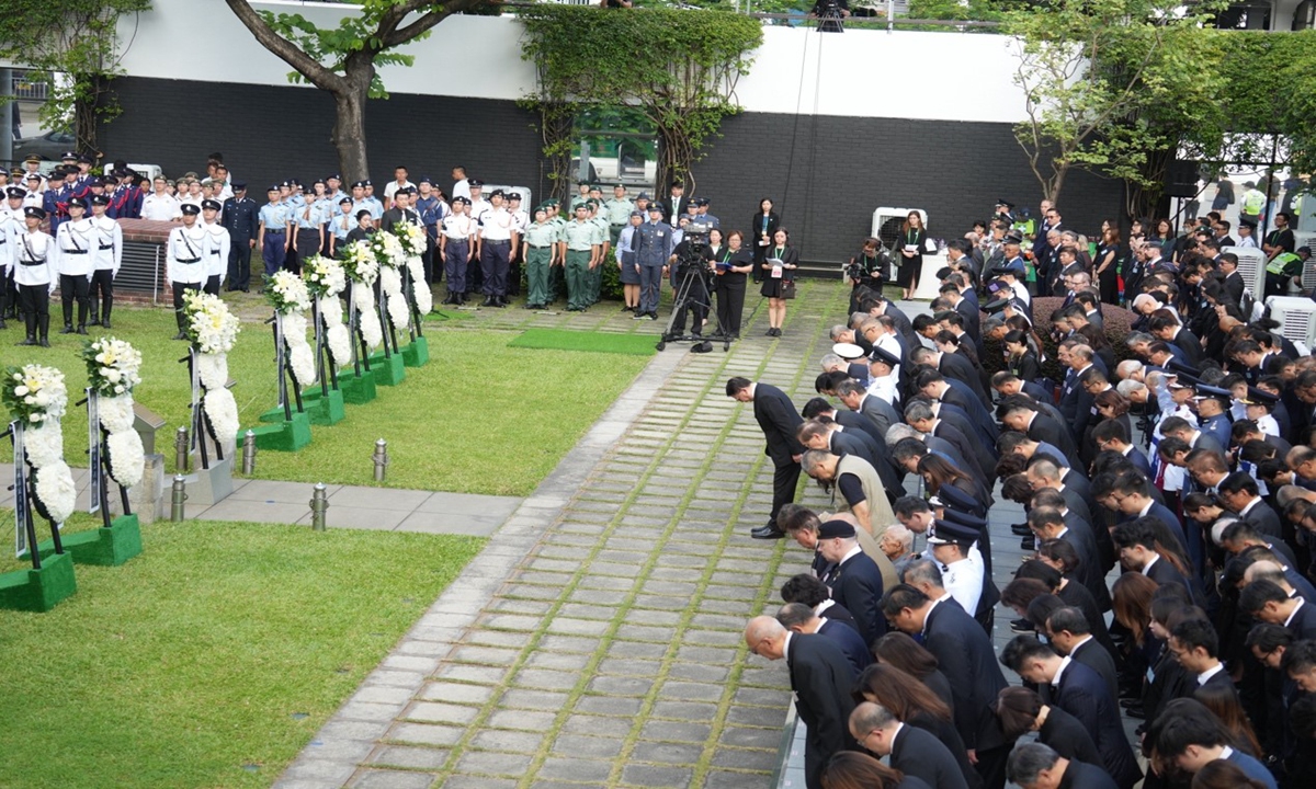 The Hong Kong Special Administrative Region (HKSAR) government held an official ceremony on Wednesday at the Hong Kong City Hall Memorial Garden to commemorate the 80th anniversary of the victory in the Chinese People's War of Resistance Against Japanese Aggression and the World Anti-Fascist War. Photo: Hong Kong Ta Kung Wen Wei Media Group
