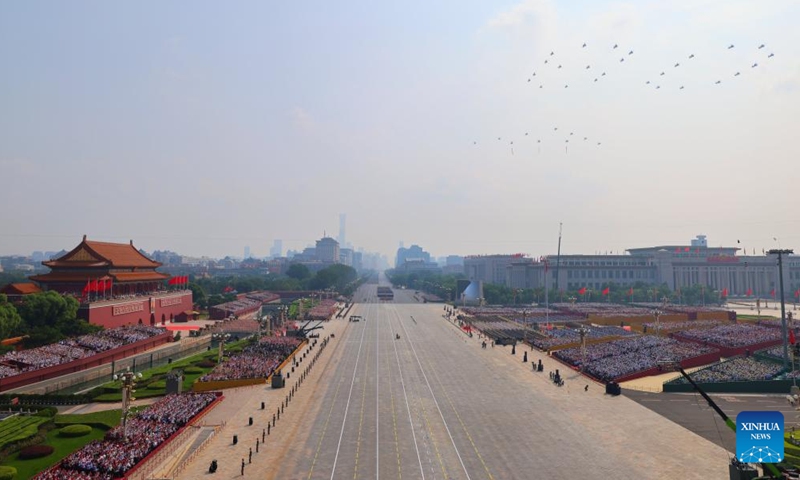 A flag-guarding air echelon flies over Tian'anmen Square during a grand gathering to commemorate the 80th anniversary of the victory in the Chinese People's War of Resistance against Japanese Aggression and the World Anti-Fascist War in Beijing, capital of China, Sept. 3, 2025. (Xinhua/Liu Xu)