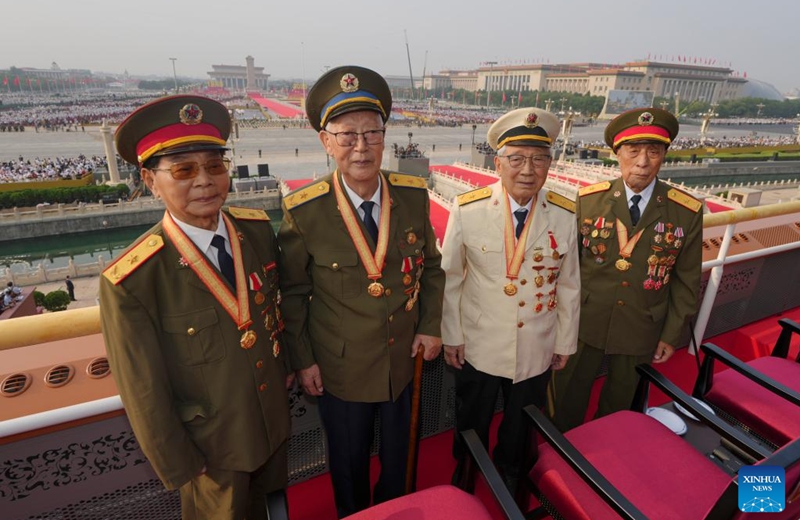 Veterans pose for a group photo at Tian'anmen Rostrum ahead of a military parade in Beijing, capital of China, Sept. 3, 2025. China on Wednesday held a grand gathering to commemorate the 80th anniversary of the victory in the Chinese People's War of Resistance against Japanese Aggression and the World Anti-Fascist War. (Xinhua/Cai Yang)