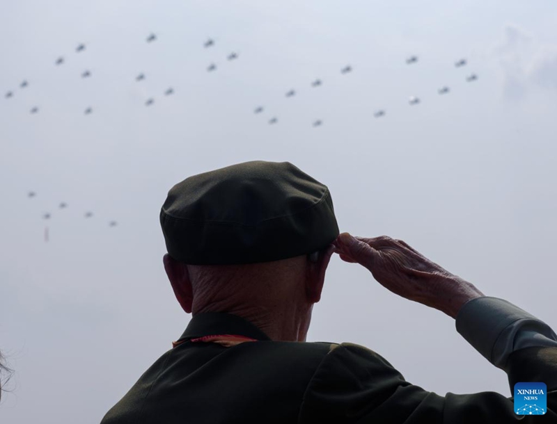 A veteran at Tian'anmen Rostrum salutes during a military parade in Beijing, capital of China, Sept. 3, 2025. China on Wednesday held a grand gathering to commemorate the 80th anniversary of the victory in the Chinese People's War of Resistance against Japanese Aggression and the World Anti-Fascist War. (Xinhua/Cai Yang)