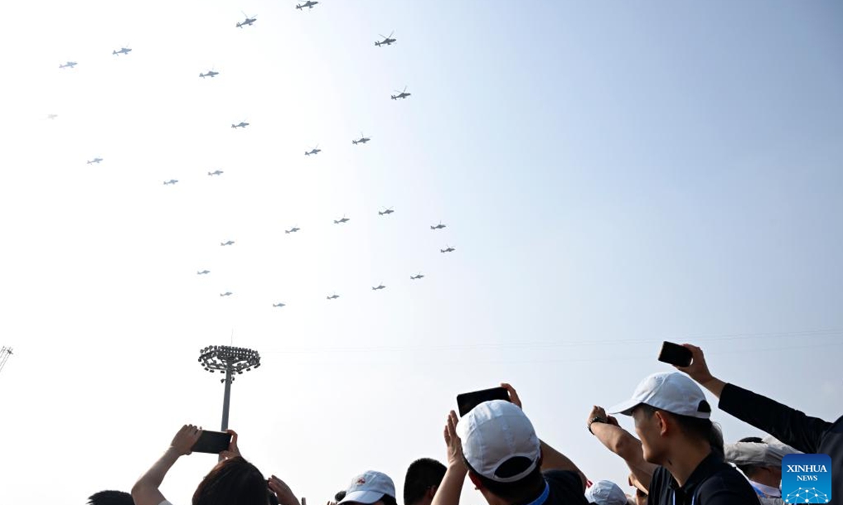The flag-guarding air echelon flies over Tian'anmen Square during a grand gathering to commemorate the 80th anniversary of the victory in the Chinese People's War of Resistance against Japanese Aggression and the World Anti-Fascist War in Beijing, capital of China, Sept. 3, 2025. (Xinhua/Liu Yongzhen)