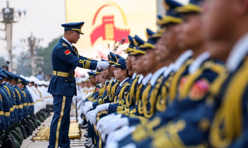 Members of the joint military band of the Chinese People's Liberation Army make preparations in Beijing, capital of China, Sept. 3, 2025. China on Wednesday held a grand gathering to commemorate the 80th anniversary of the victory in the Chinese People's War of Resistance against Japanese Aggression and the World Anti-Fascist War. (Xinhua/Zhang Yuwei)