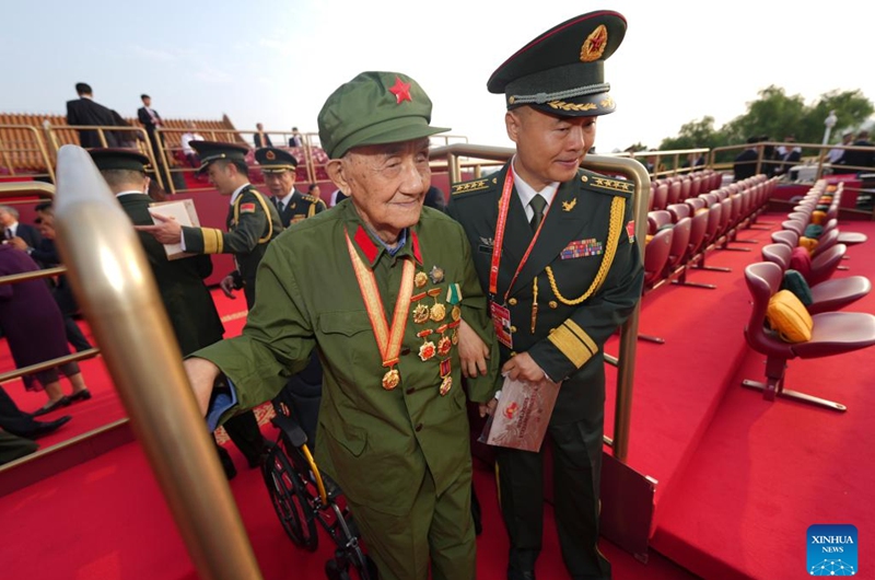 A veteran ascends Tian'anmen Rostrum ahead of a military parade in Beijing, capital of China, Sept. 3, 2025. China on Wednesday held a grand gathering to commemorate the 80th anniversary of the victory in the Chinese People's War of Resistance against Japanese Aggression and the World Anti-Fascist War. (Xinhua/Cai Yang)