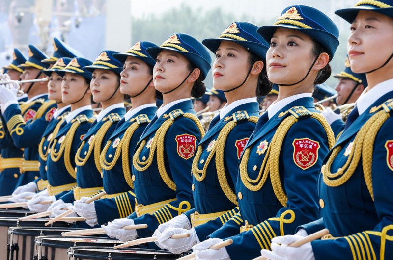 Members of the joint military band of the Chinese People's Liberation Army make preparations ahead of a grand gathering to commemorate the 80th anniversary of the victory in the Chinese People's War of Resistance against Japanese Aggression and the World Anti-Fascist War in Beijing, capital of China, Sept. 3, 2025. (Xinhua/Zhang Yuwei)