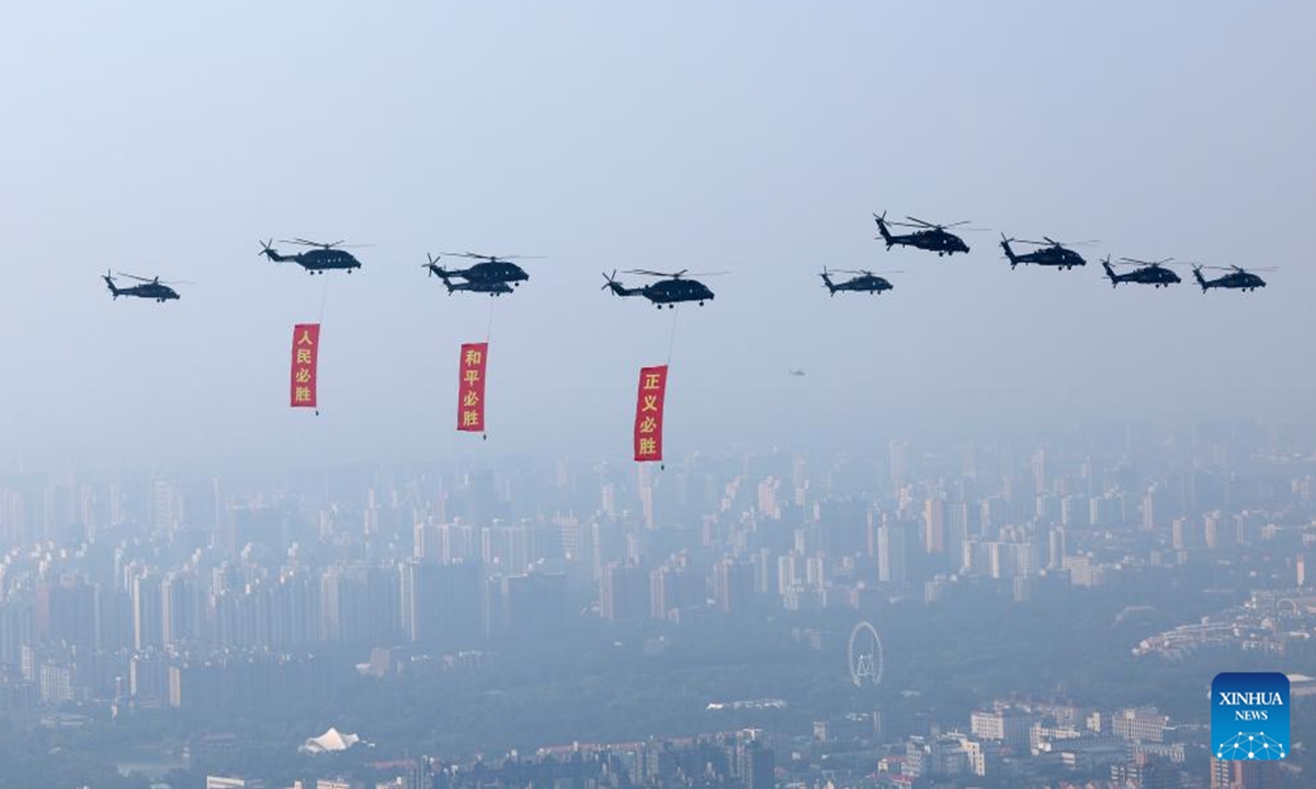 The flag-guarding air echelon takes part in a grand gathering to commemorate the 80th anniversary of the victory in the Chinese People's War of Resistance against Japanese Aggression and the World Anti-Fascist War in Beijing, capital of China, Sept. 3, 2025. (Xinhua/Na Yuqi)