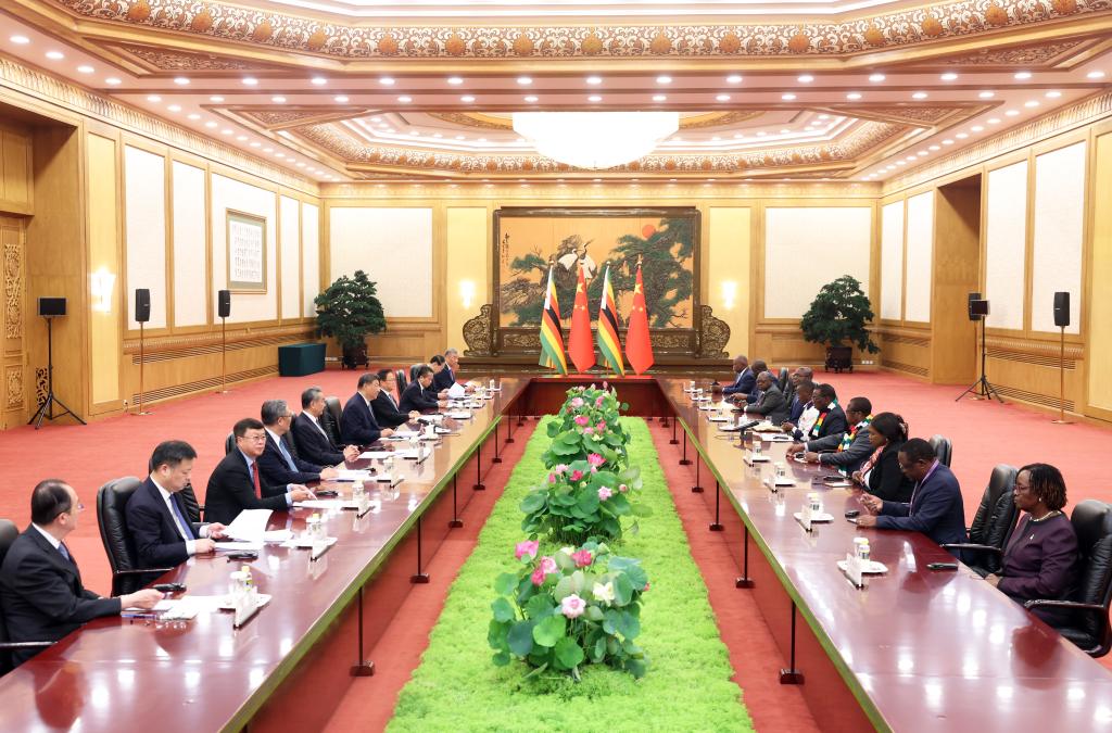 Chinese President Xi Jinping meets with Zimbabwean President Emmerson Mnangagwa, who is in China for commemorations marking the 80th anniversary of the victory in the Chinese People's War of Resistance against Japanese Aggression and the World Anti-Fascist War, at the Great Hall of the People in Beijing, capital of China, Sept. 4, 2025. Xi and Mnangagwa announced here on Thursday upgrading the two countries' relations to an all-weather community with a shared future. (Xinhua/Liu Weibing)