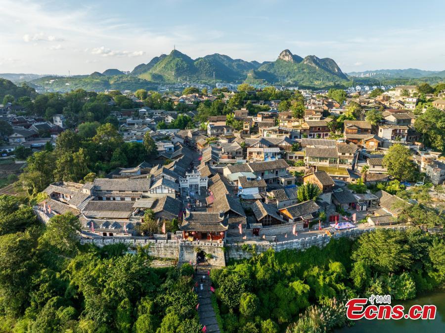 Tourists visit Qingyan ancient town in Guiyang City, southwest China's Guizhou Province on Sept. 3, 2025. Qingyan ancient town in Guizhou Province served as a key military stronghold during the Ming and Qing dynasties (1368-1911), with well-preserved ancient architecture scattered throughout the town.（Photo: Ecns.cn)