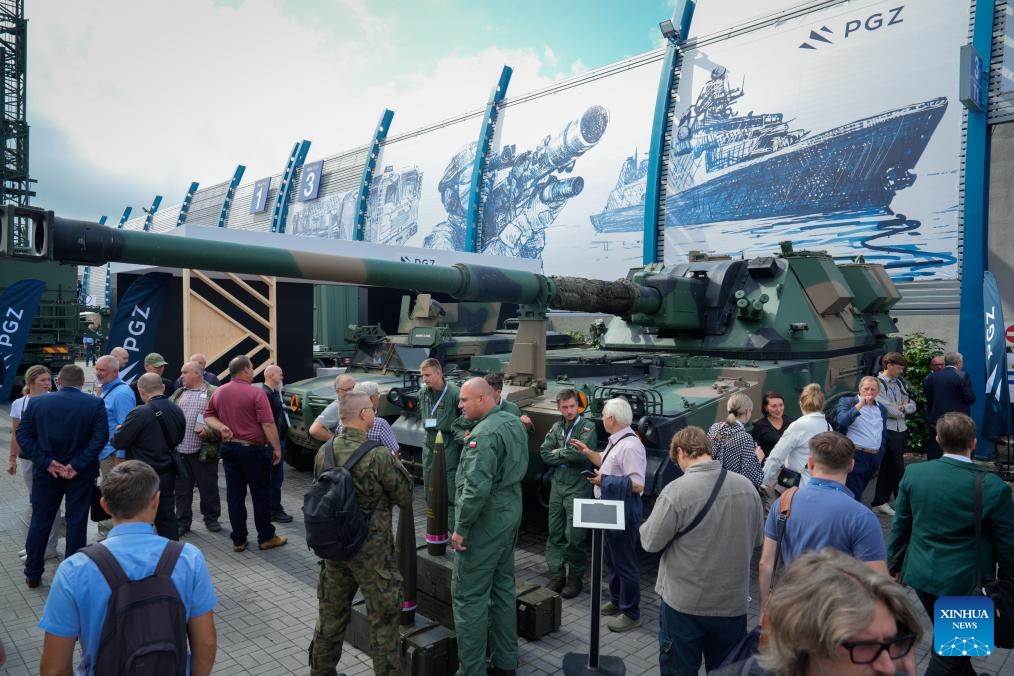 People visit the 33rd International Defence Industry Exhibition in Kielce, Poland on Sept. 3, 2025. The event runs from Tuesday to Friday, showcasing new achievements in military equipment development as well as cutting-edge technologies and systems for logistics, security and rescue. (Photo: Xinhua)