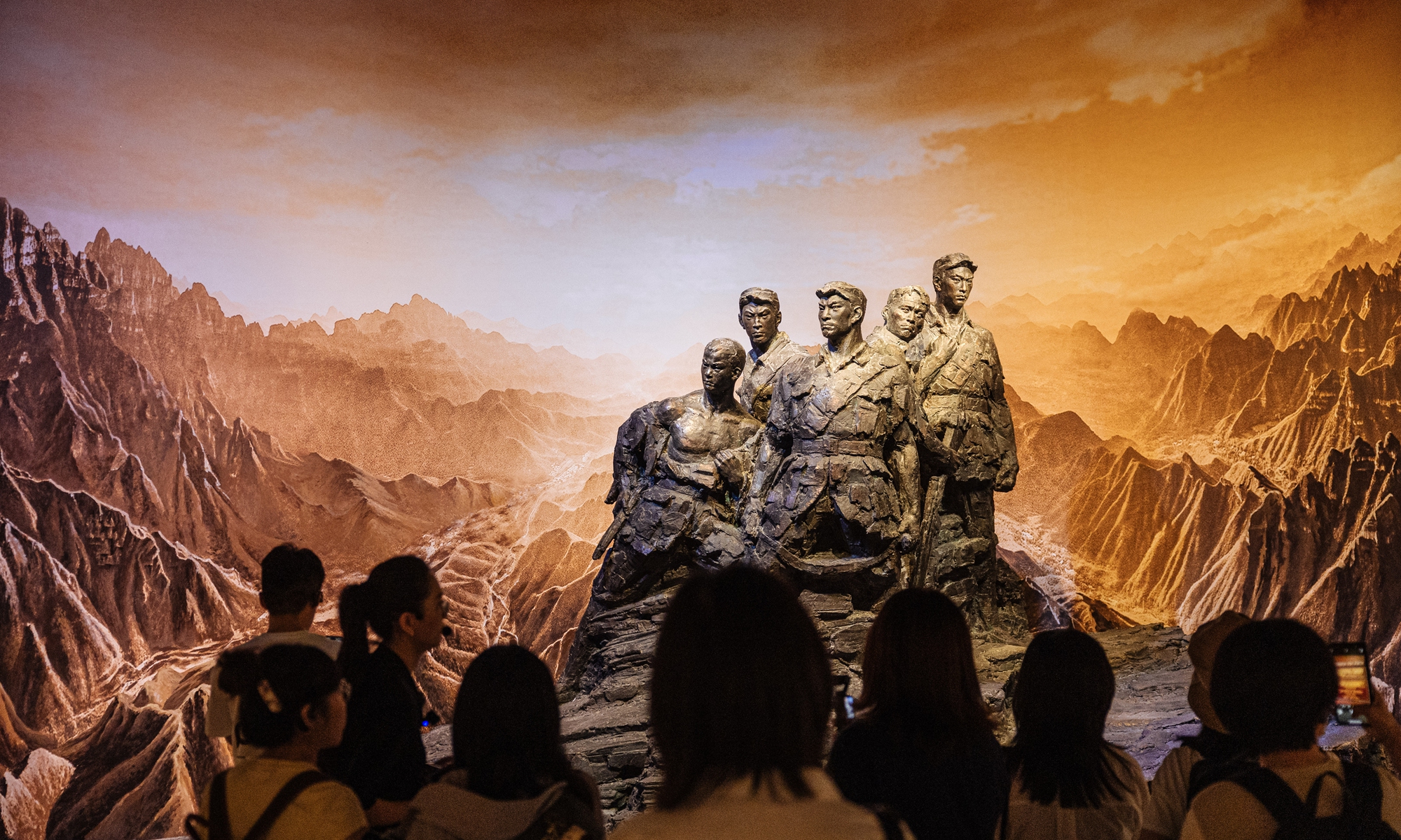 Visitors view a set of statues at the Museum of the War of Chinese People's Resistance Against Japanese Aggression in Beijing on July 7. Photo: Li Hao/GT