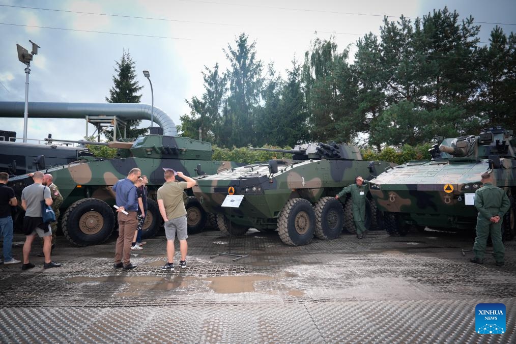 People visit the 33rd International Defence Industry Exhibition in Kielce, Poland on Sept. 3, 2025. The event runs from Tuesday to Friday, showcasing new achievements in military equipment development as well as cutting-edge technologies and systems for logistics, security and rescue. (Photo: Xinhua)