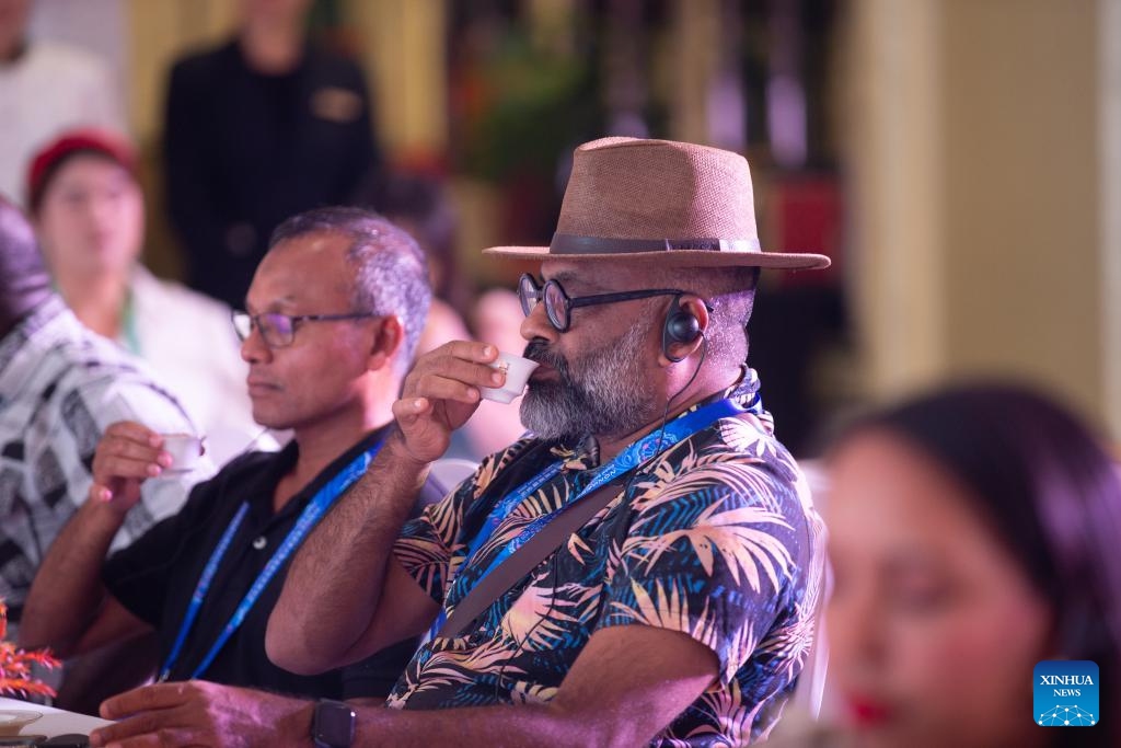 Guests taste Pu'er tea at an event during the 2025 Global South Media and Think Tank Forum in Kunming, southwest China's Yunnan Province, Sept. 6, 2025. (Photo: Xinhua)
