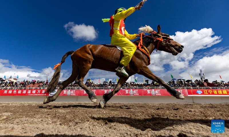 Contestants compete in a trotting race during the 2025 edition of a traditional horse racing festival in Nagqu, southwest China's Xizang Autonomous Region, Sept. 6, 2025. The three-day festival, a traditional event on the northern Tibetan Plateau, kicked off in Nagqu on Friday. In addition to traditional horse racing, the festival also features a variety of ethnic sports competitions, art performances, and cultural tourism activities, drawing large crowds of locals and visitors. (Photo: Xinhua)