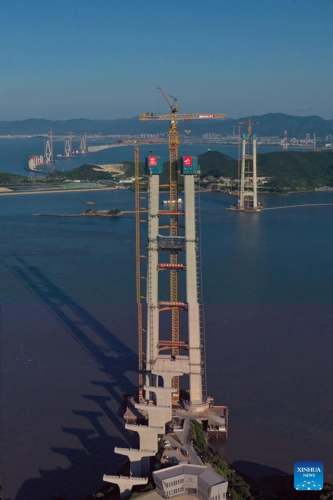 An aerial drone photo taken on Sept. 6, 2025 shows the construction site of the east main tower of Shuangyumen super major bridge in east China's Zhejiang Province. The east main tower of the Shuangyumen super major bridge, the first main tower of the second phase of the Liuheng highway bridge in Zhoushan Port of Zhejiang's Ningbo, witnessed its topping-out on Saturday, marking a breakthrough in the construction of the bridge and laying foundation for the following construction. (Photo: Xinhua)
