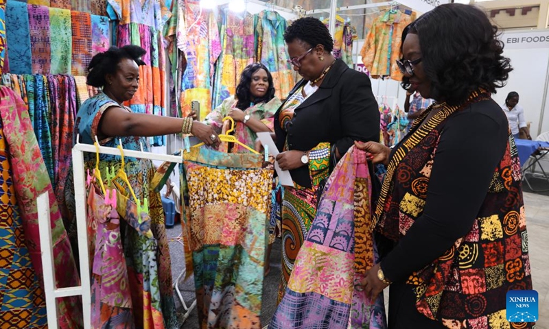People visit a local fabric booth during the fourth Made-in-Ghana Bazaar in Accra, Ghana, Sept. 5, 2025. The three-day event opened here on Friday. (Photo: Xinhua)