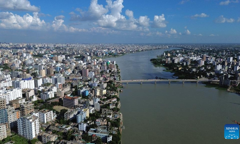 An aerial drone photo taken on Sept. 5, 2025 shows a city view along the Buriganga River in Dhaka, Bangladesh. (Photo: Xinhua)