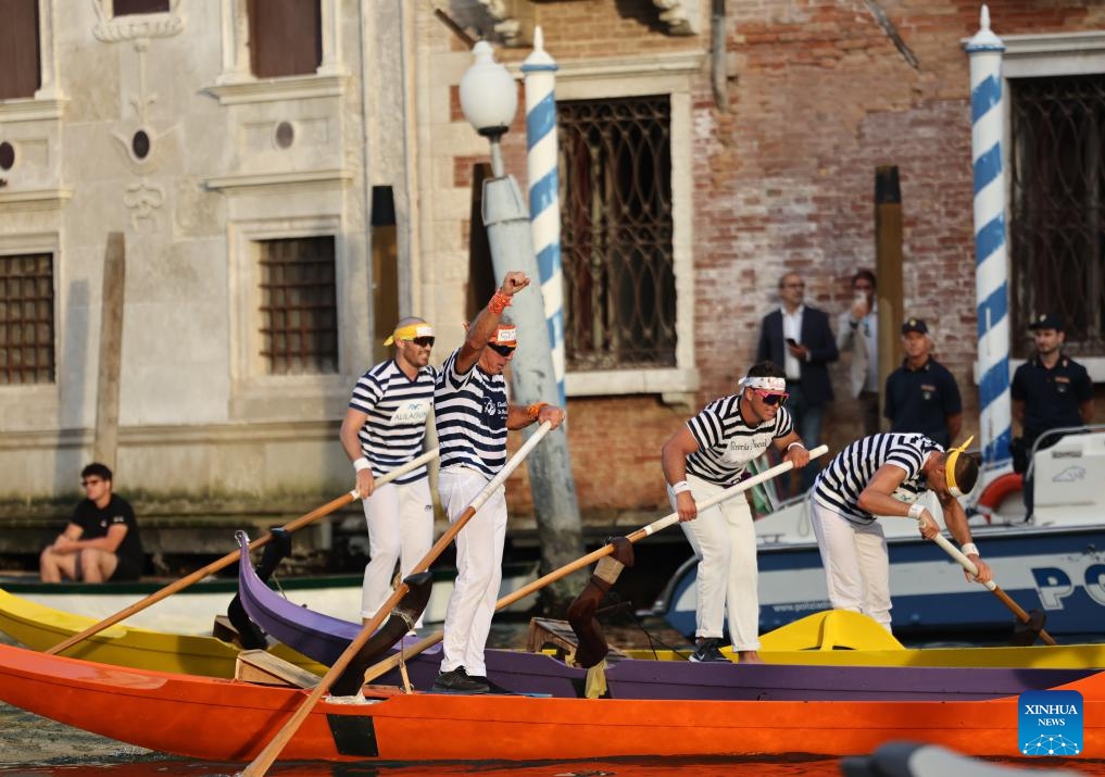 People take part in the Regata Storica boat race in Venice, Italy, Sept. 7, 2025. The Regata Storica is a historic annual boat parade and rowing race on the Grand Canal in Venice. (Photo: Xinhua)