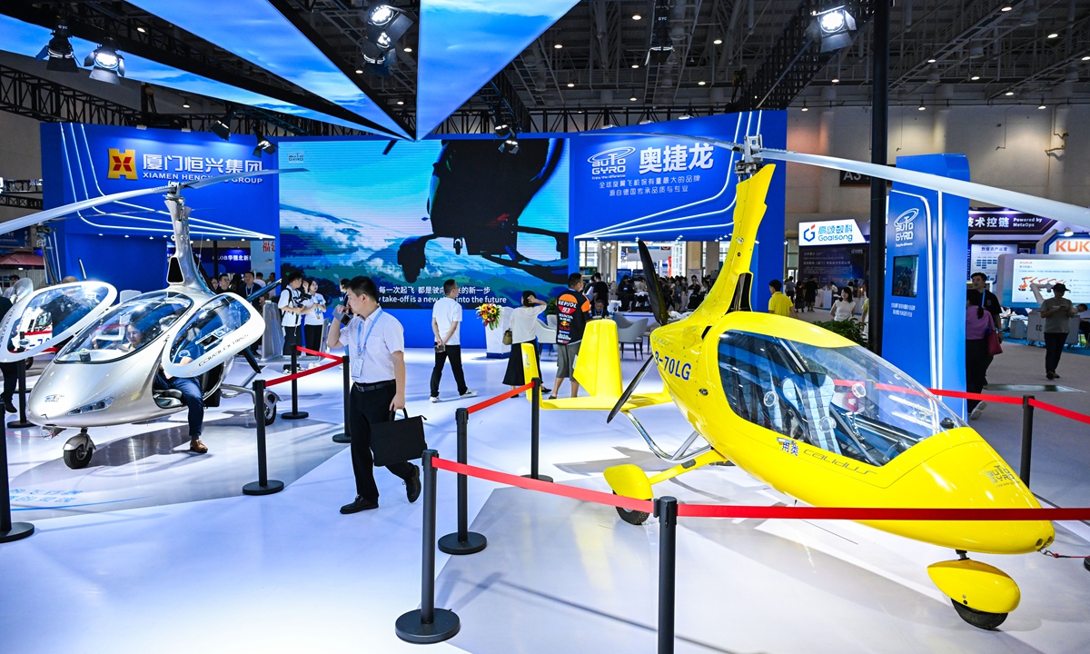 Visitors browse rotorcrafts and helicopters on display at the 25th China International Fair for Investment and Trade (CIFIT) in Xiamen, East China's Fujian Province on September 9, 2025 Photo: VCG