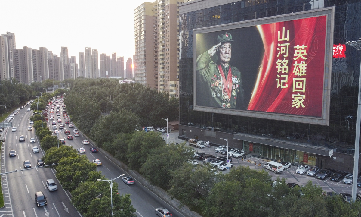 A poster of a veteran soldier of the Chinese People's Volunteers (CPV) saluting is seen along Qingnian Street in Shenyang, capital of Northeast China's Liaoning Province on September 10, 2025. China will hold a burial ceremony on September 13 in Shenyang to honor the remains of 30 CPV soldiers who died during the War to Resist US Aggression and Aid Korea (1950-1953). Photo: VCG