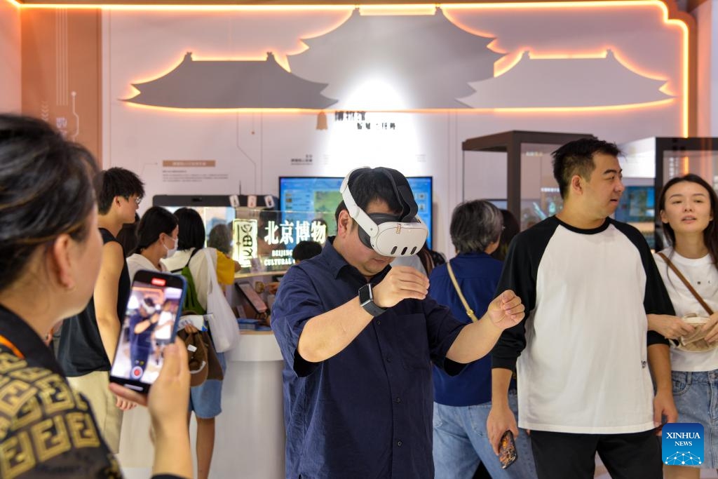 Visitors watch the exhibition This is the Shang with MR devices at the Cultural & Tourism Services exhibition area of the 2025 China International Fair for Trade in Services (CIFTIS) at Shougang Park in Beijing, capital of China, Sept. 13, 2025. At the 2025 CIFTIS, a variety of cutting-edge technologies have enriched the exhibition, providing more interactive and immersing cultural and tourism experiences for visitors. (Photo: Xinhua)