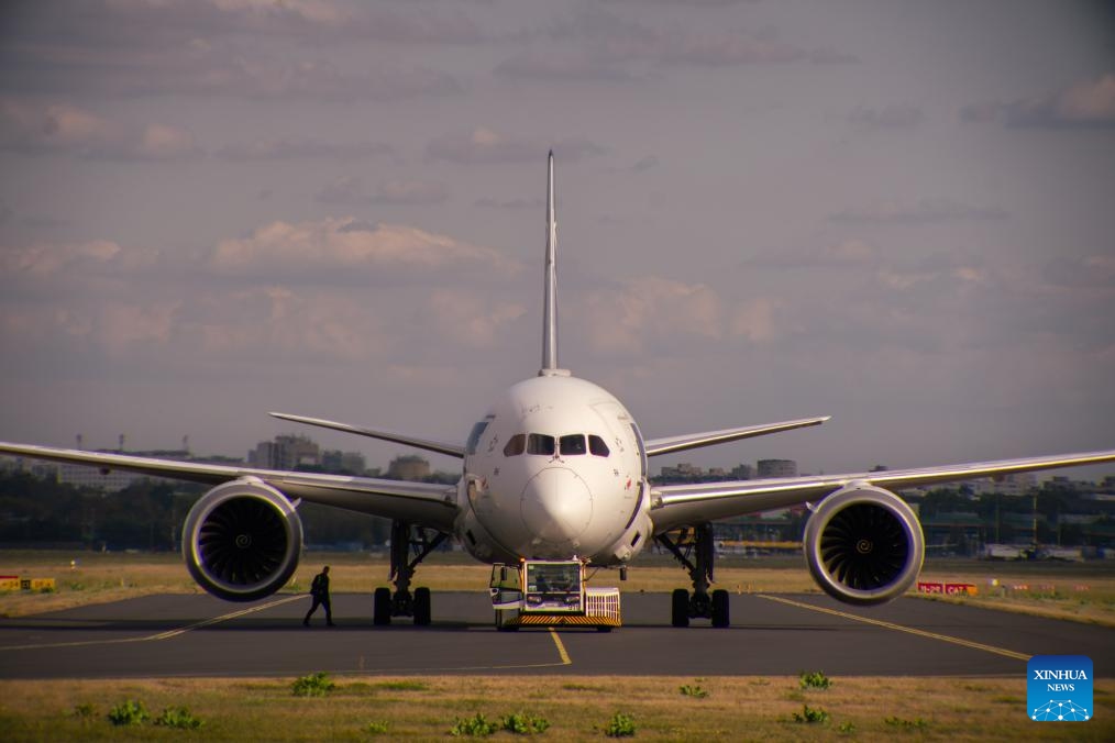 This photo taken on Sept. 12, 2025 shows a passenger airplane waiting at Warsaw Chopin Airport in Warsaw, Poland. The airport authorities announced Friday that the airport handled 2.5 million passengers in August. (Photo: Xinhua)