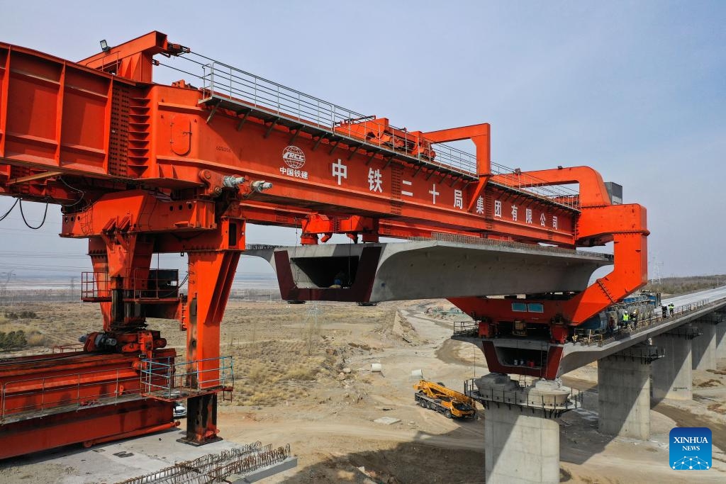 A drone photo taken on March 6, 2025 shows the closed Heyuancun Grand Bridge of Baotou-Yinchuan High-speed Railway in north China's Inner Mongolia Autonomous Region. The Heyuancun Grand Bridge was successfully closed on Thursday, marking the completion of the bridges and tunnels within the Inner Mongolia section of Baotou-Yinchuan High-speed Railway, which links Baotou in Inner Mongolia and Yinchuan in northwest China's Ningxia Hui Autonomous Region. (Photo: Xinhua)