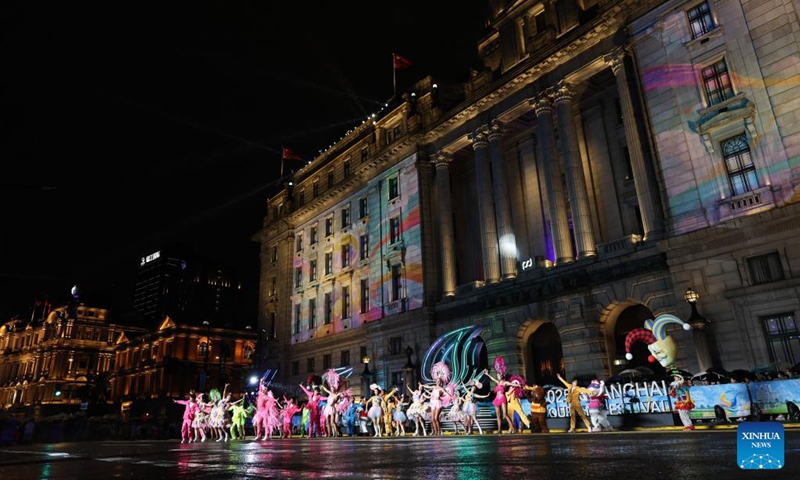Actors perform in front of buildings at the Bund during the floats parade of the Shanghai Tourism Festival in Shanghai, east China, Sept. 13, 2025. The launching ceremony of the 36th Shanghai Tourism Festival floats parade was held in Huangpu District of Shanghai on Saturday. A total of 25 floats and 24 performing teams from 15 countries and regions took part in the parade. (Photo: Xinhua)