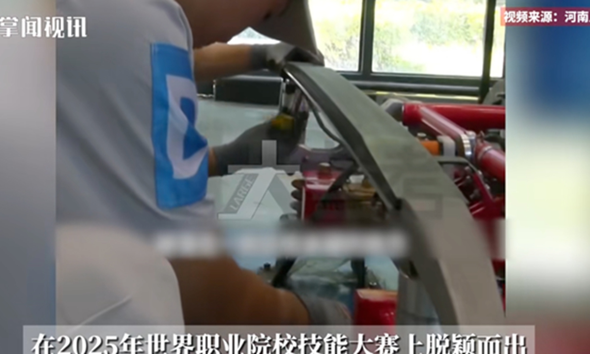 A Chinese college mechanic student from Zhengzhou, Central China's Henan Province wins gold prize in the rail transportation category with his remarkable hardware skills in the 2025 World Vocational College Skills Competition. Photo: web