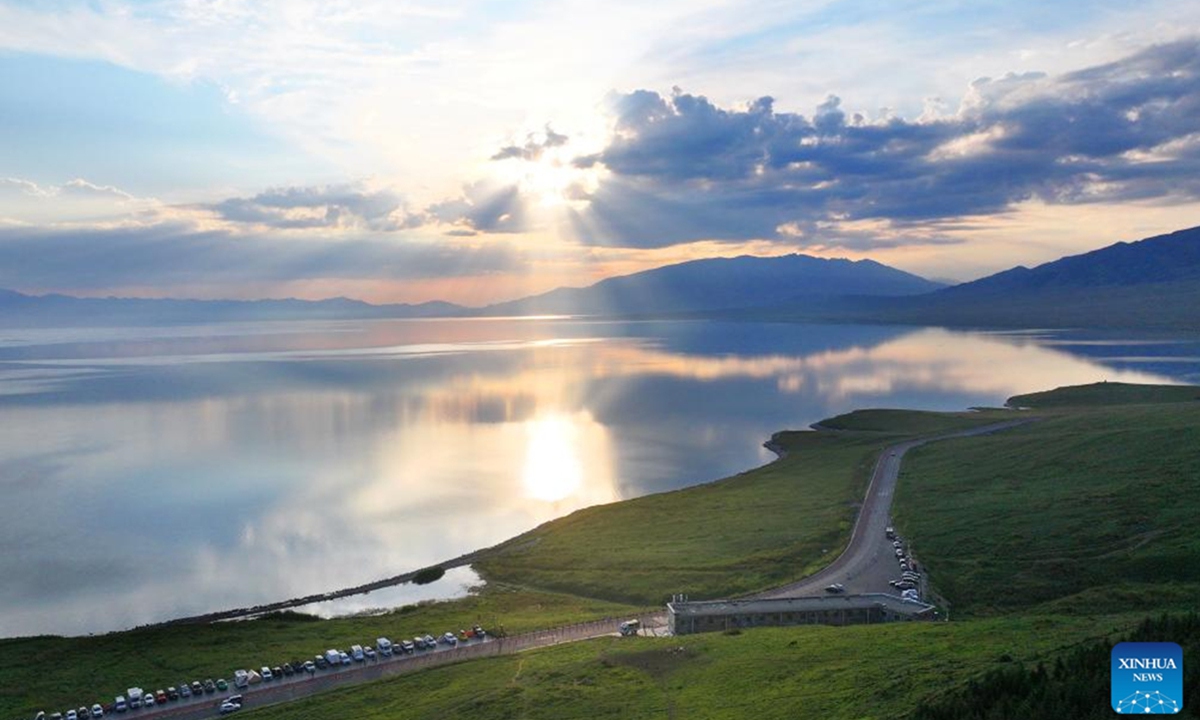An aerial drone photo taken on July 17, 2025 shows the scenery of Sayram Lake in Bortala Mongolian Autonomous Prefecture, northwest China's Xinjiang Uygur Autonomous Region. Nestled in the Tianshan Mountains, Sayram Lake, Xinjiang's highest and largest alpine lake, has entered its peak tourist season in midsummer. Photo: Xinhua