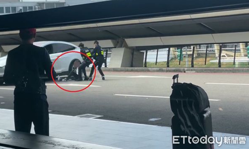 Taiwan police capture an illegal taxi driver after firing 8 shots at Taiwan Taoyuan International Airport on September 20. Photo: ettoday.net