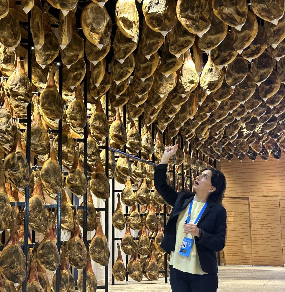 Catherine Gulua, founder of the Mtavari Media Center, Georgia, visits the Xuanwei Ham Exhibition Hall in Xuanwei, Yunnan Province, on September 20, 2025.