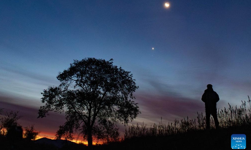 This photo taken on Sept. 19, 2025 shows the planet of Venus, the star of Regulus in the constellation Leo and a crescent moon in the sky over Fujin City of Jiamusi, northeast China's Heilongjiang Province. (Photo: Xinhua)
