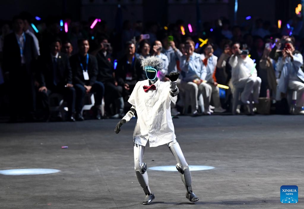 A robot performs at the opening ceremony of the 3rd Vocational Skills Competition in Zhengzhou, central China's Henan Province, Sept. 19, 2025. The 3rd Vocational Skills Competition of the People's Republic of China kicked off here on Friday. The competition features 106 events, with a total of 3,420 competitors across China attending. (Photo: Xinhua)