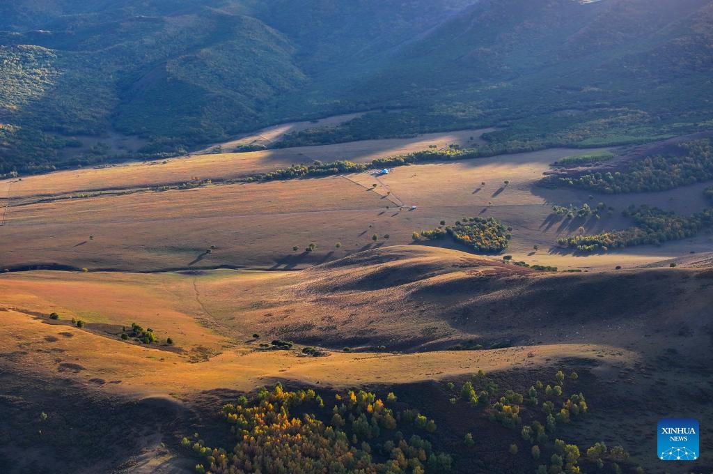 An aerial drone photo taken on Sept. 20, 2025 shows the autumn scenery of the Hanshan Mountain in Jarud Banner, Tongliao City of north China's Inner Mongolia Autonomous Region. Located in Jarud Banner of north China's Inner Mongolia Autonomous Region, the Hanshan Mountain national nature reserve was set up in 2013. Sitting in the south of the Greater Khingan Mountains, it serves as an ecological shelter and a water conservation area for the Horqin Grasslands. (Photo: Xinhua)