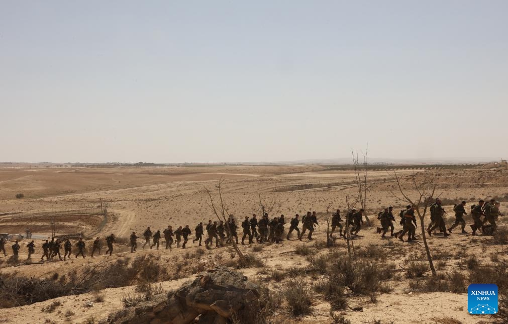 Newly recruited combat soldiers of the Israeli army take part in a training at a site in southern Israel, Sept. 21, 2025. (Photo: Xinhua)