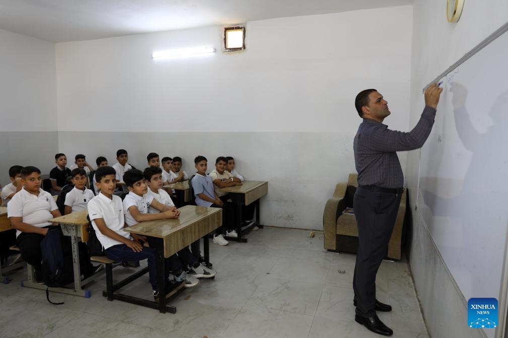 Students attend a class at a primary school on the first day of a new academic year in Baghdad, Iraq, on Sept. 21, 2025. The new academic school year started on Sunday in Iraq. (Photo: Xinhua)