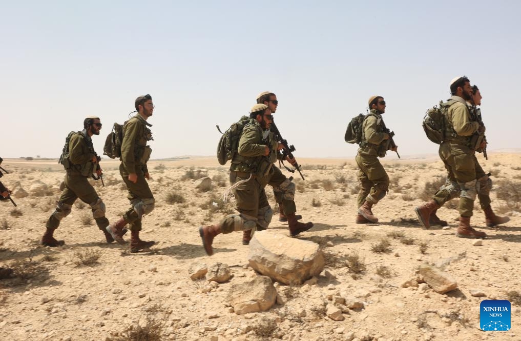 Newly recruited combat soldiers of the Israeli army take part in a training at a site in southern Israel, Sept. 21, 2025. (Photo: Xinhua)