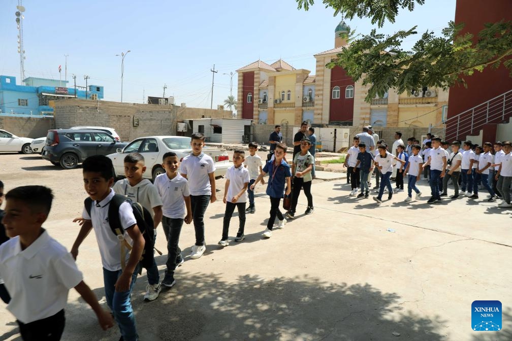 This photo taken on Sept. 21, 2025 shows primary school students back to school in Baghdad, Iraq. The new academic school year started on Sunday in Iraq. (Photo: Xinhua)