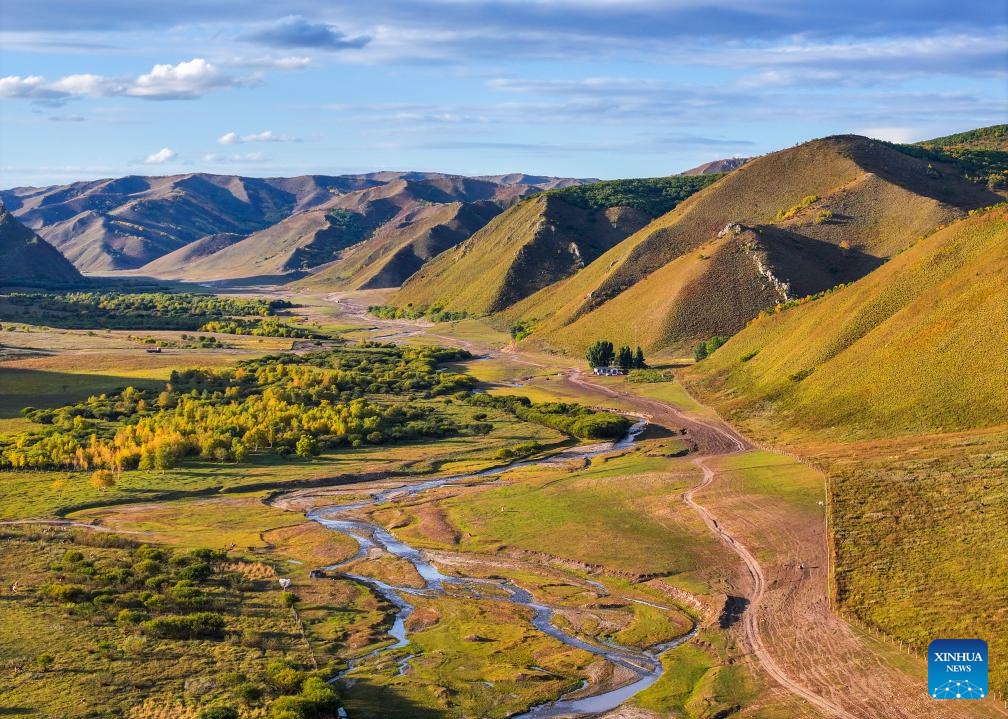An aerial drone photo taken on Sept. 20, 2025 shows the autumn scenery of the Hanshan Mountain in Jarud Banner, Tongliao City of north China's Inner Mongolia Autonomous Region. Located in Jarud Banner of north China's Inner Mongolia Autonomous Region, the Hanshan Mountain national nature reserve was set up in 2013. Sitting in the south of the Greater Khingan Mountains, it serves as an ecological shelter and a water conservation area for the Horqin Grasslands. (Photo: Xinhua)