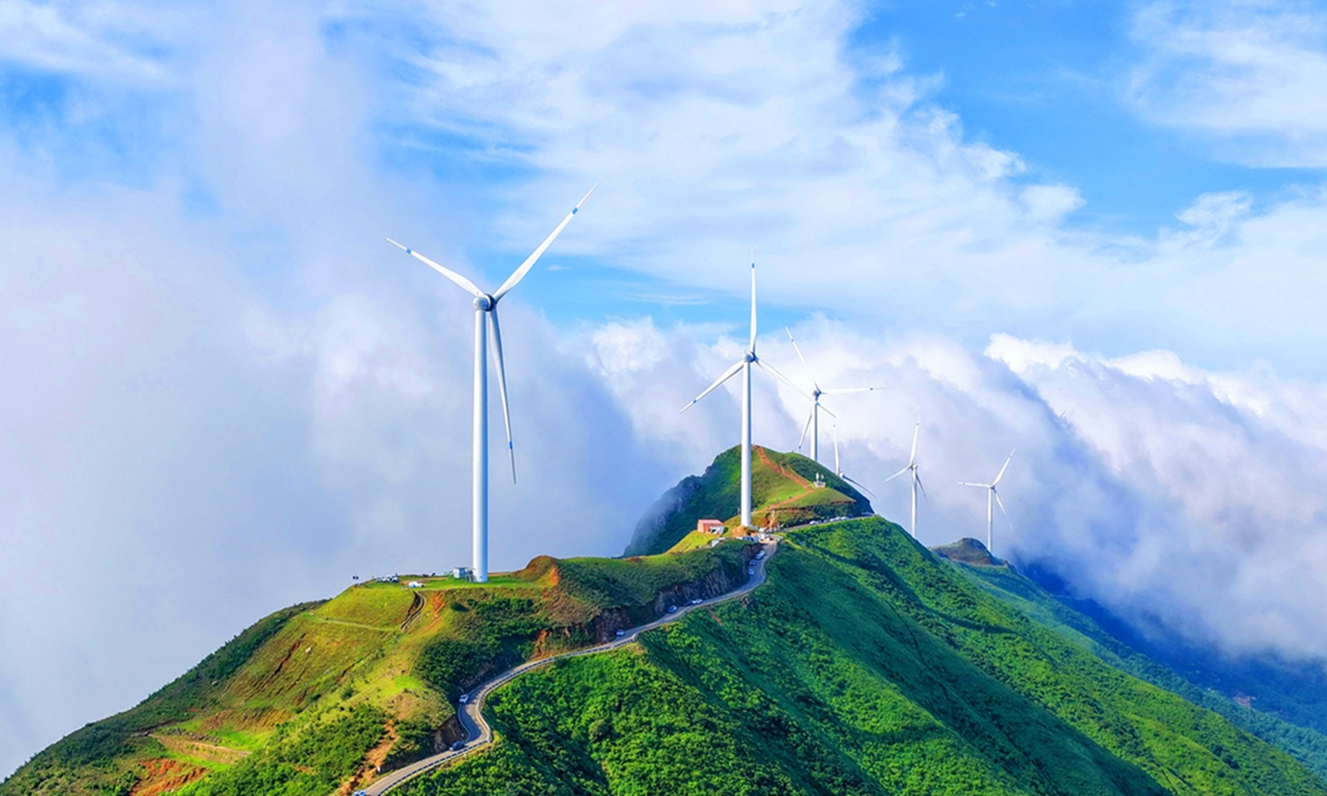 Wind turbines spin in the breeze on a mountain in Shangyou County, Ganzhou, East China's Jiangxi Province, on August 6, 2025. Photo: VCG
