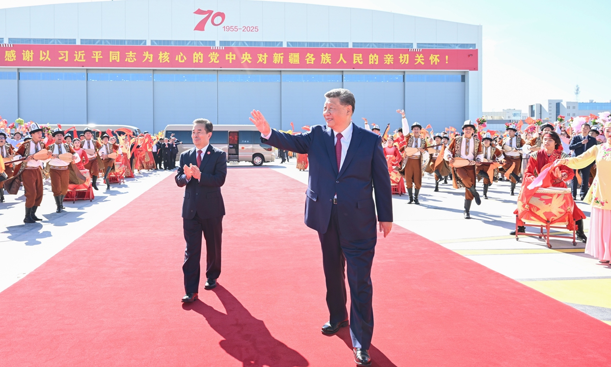 Chinese President Xi Jinping, also general secretary of the Communist Party of China Central Committee and chairman of the Central Military Commission, waves to a cheering crowd giving him a warm send-off at Urumqi Tianshan International Airport, Xinjiang Uygur Autonomous Region on September 25,2025. Photo: Xinhua