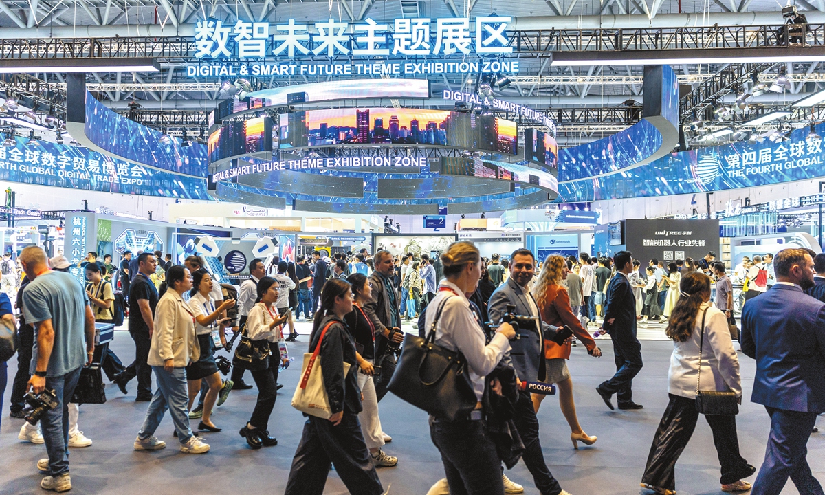Visitors walk through the Digital & Smart Future Theme Exhibition Zone at the 4th Global Digital Trade Expo on September 25, 2025. Photo: Li Hao/GT