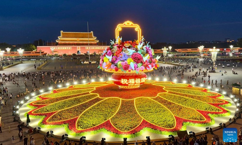 This photo taken on Sept. 25, 2025 shows the night view of a flower basket installation at Tian'anmen Square in Beijing, capital of China. The 18-meter-high installation in the shape of a flower basket is placed at Tian'anmen Square as a decoration for the upcoming National Day holiday. (Xinhua)