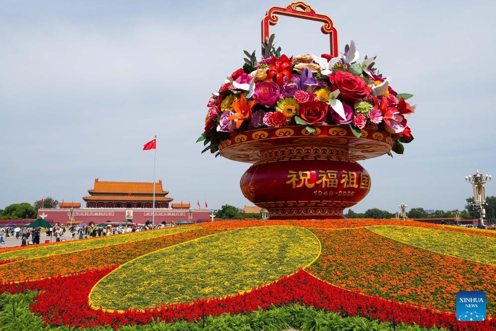 This photo taken on Sept. 25, 2025 shows a flower basket installation at Tian'anmen Square in Beijing, capital of China. The 18-meter-high installation in the shape of a flower basket is placed at Tian'anmen Square as a decoration for the upcoming National Day holiday. (Xinhua/Ju Huanzong)