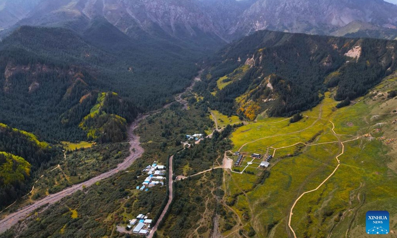 An aerial drone photo taken on Sept. 26, 2025 shows the autumn view around the Mati Temple Grottoes in Zhangye City, northwest China's Gansu Province. First built around 1,600 years ago along the route of the ancient Silk Road, the Mati Temple Grottoes are famous for Buddhist relics preserved in more than 70 caves, including more than 500 colored sculptures as well as murals spanning a total of over 1,200 sq meters. (Xinhua/Zhang Zhimin)