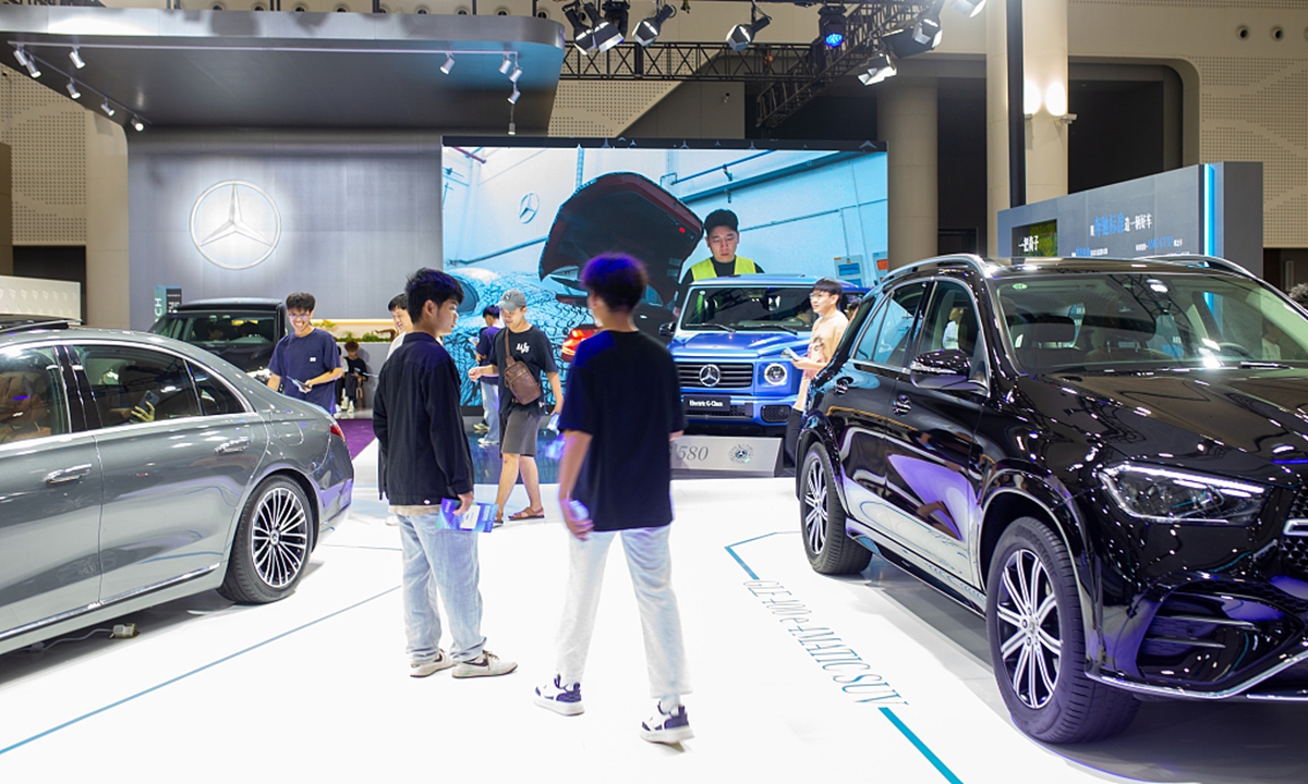 People visit cars on display at the 7th World New Energy Vehicle Congress (WNEVC) at the Hainan International Convention and Exhibition Center in Haikou, South China's Hainan Province, on September 27, 2025. Photo: VCG