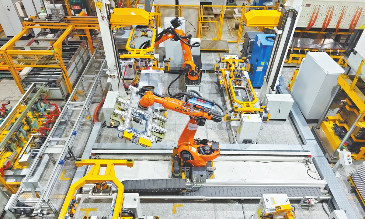 Robotic arms operate in a factory in Nanjing, East China's Jiangsu Province, on September 20, 2025. Photo: VCG