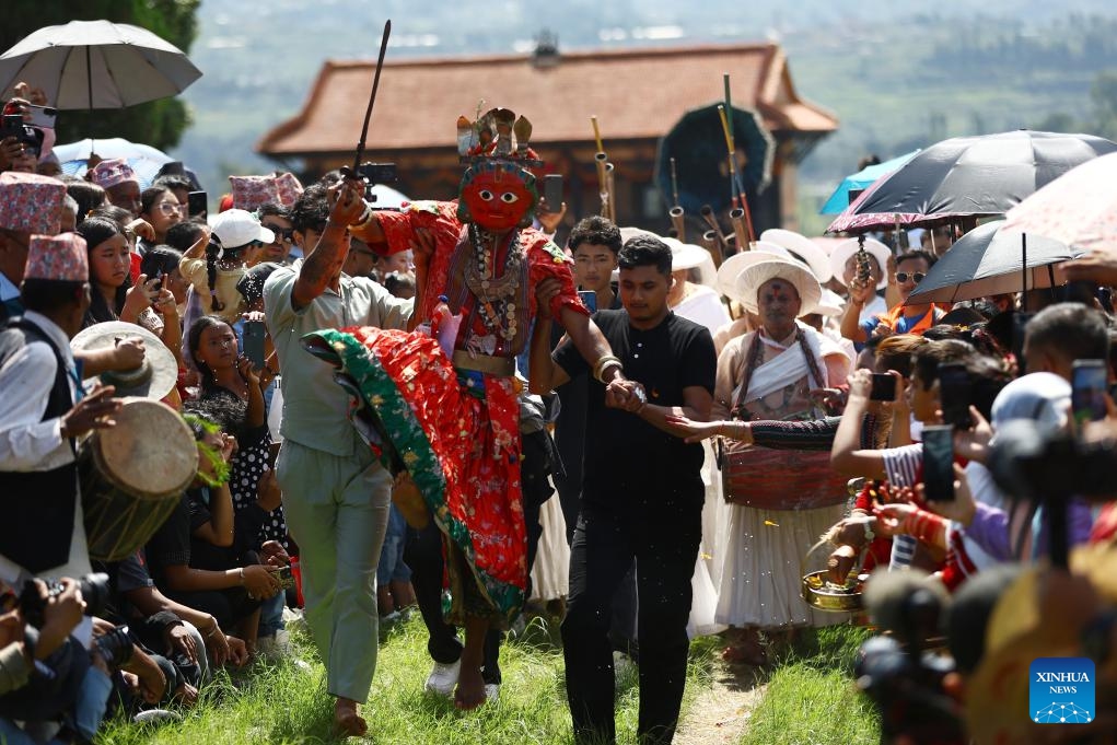 A masked dancer performs during an event in celebration of the Sikali Jatra festival in Lalitpur, Nepal, Sept. 27, 2025. The festival, also called the festival of Rudrayani, is celebrated here on Saturday. (Photo: Xinhua)