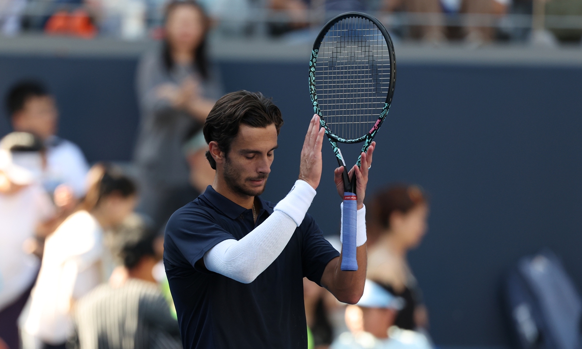 Lorenzo Musetti of Italy reacts after his victory against Adrian Mannarino of France in the men's singles round of 16 match druing the 2025 China Open at the Lotus court of the National Tennis Center in Beijing on September 28, 2025. Photo: VCG