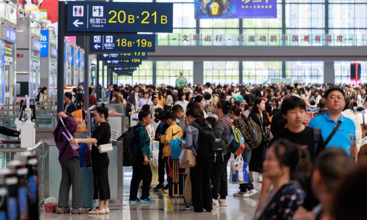 Passengers wait at the departure hall of Guiyang North Railway Station in Guiyang, southwest China's Guizhou Province, May 1, 2025. (Photo: Xinhua)