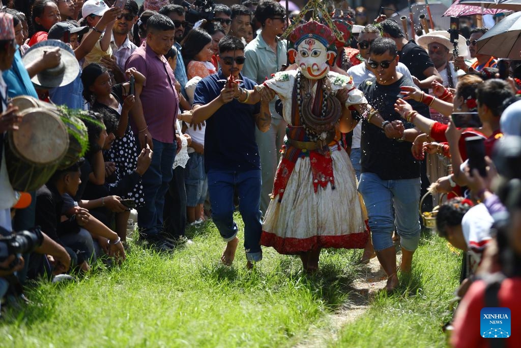 A masked dancer performs during an event in celebration of the Sikali Jatra festival in Lalitpur, Nepal, Sept. 27, 2025. The festival, also called the festival of Rudrayani, is celebrated here on Saturday. (Photo: Xinhua)